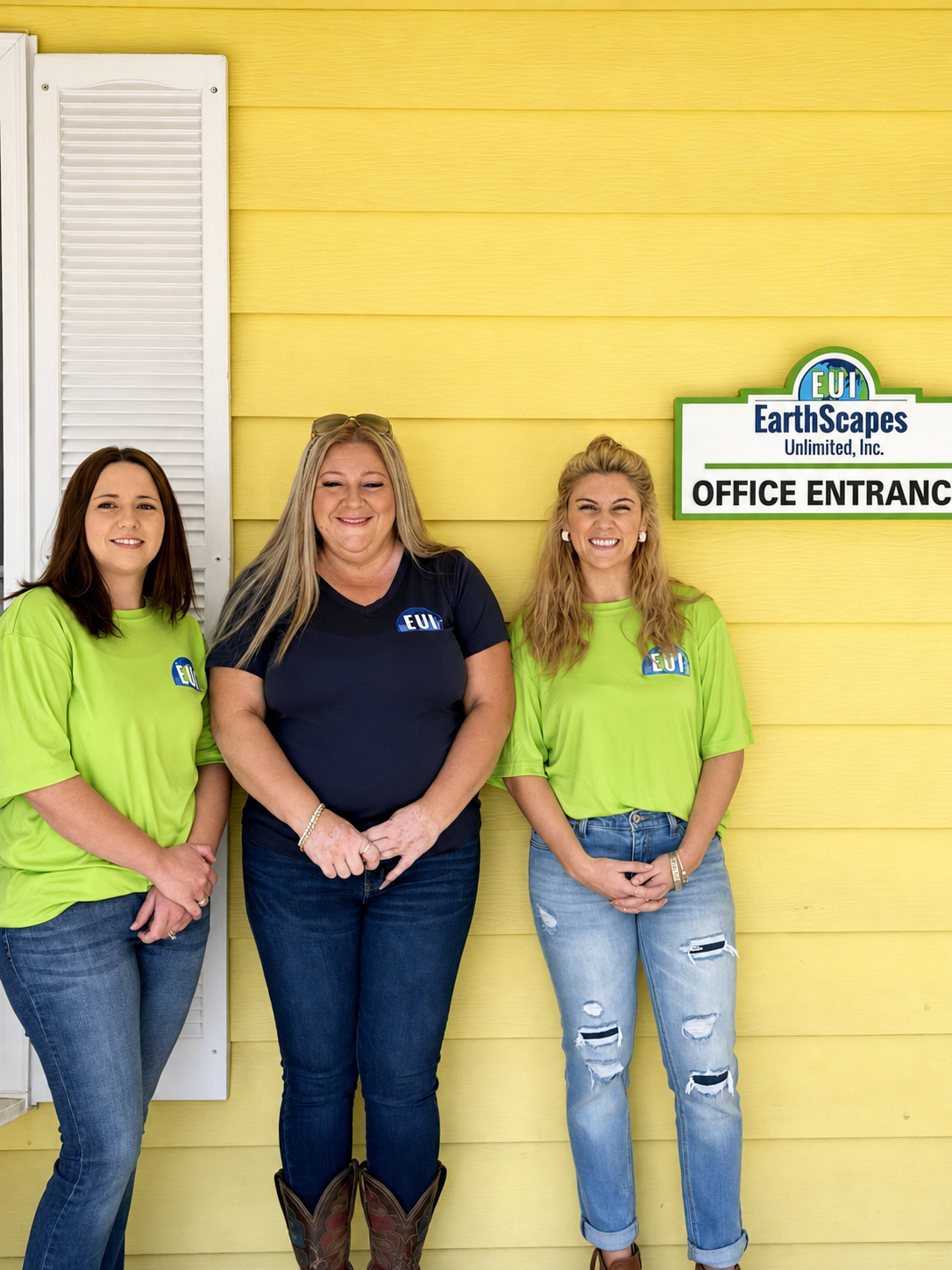 Earthscapes Unlimited office entrance team, left to right: Amber Bell, Sandra Paulikevitch, and Brooke