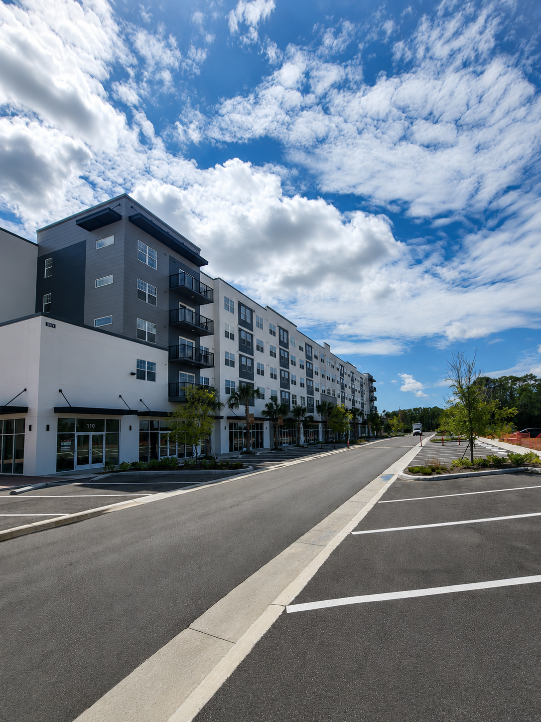Millenia Park Apartments building frontage along a finished internal street